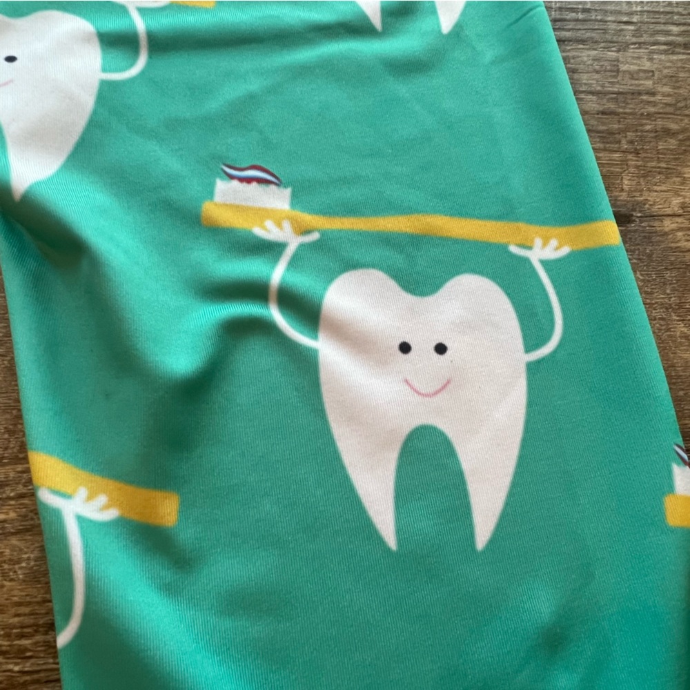 Aqua Green Leggings with Teeth and Toothpaste Print.